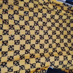 Yellow and Black Checkered Quilt